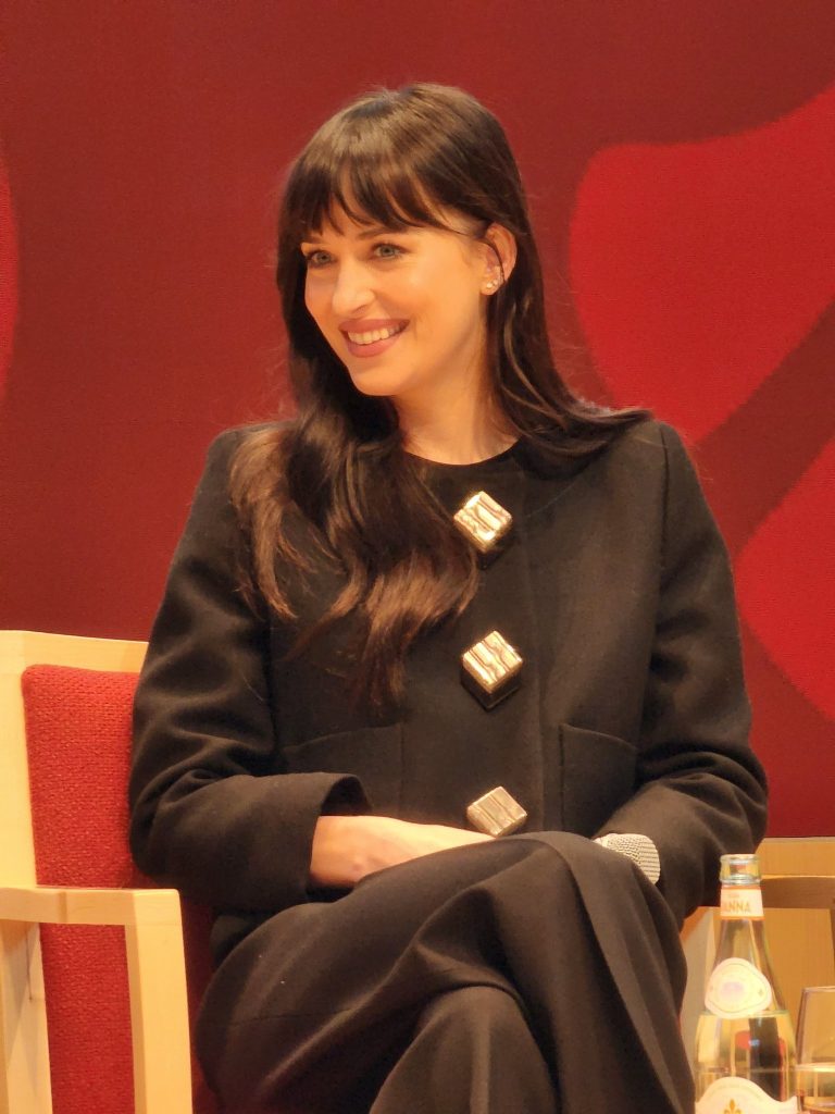 Dakota Johnson Attended The 32nd Annual Women in Business Conference At Harvard Business School