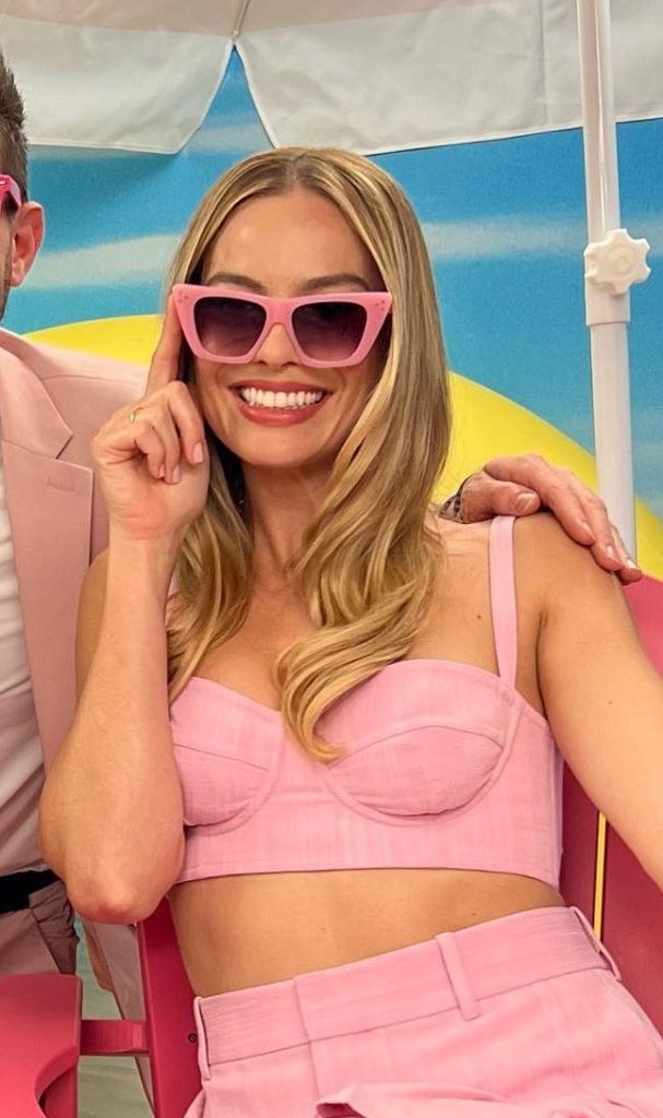 Margot Robbie Spotted in Pink Ensemble with Bottega Veneta Bag at 'Barbie' Press Tour in Los Angeles
