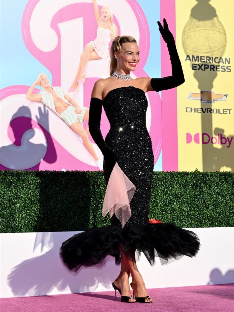 Margot Robbie Stuns as Barbie in 'Solo in the Spotlight' For the 'Barbie' Film Premiere