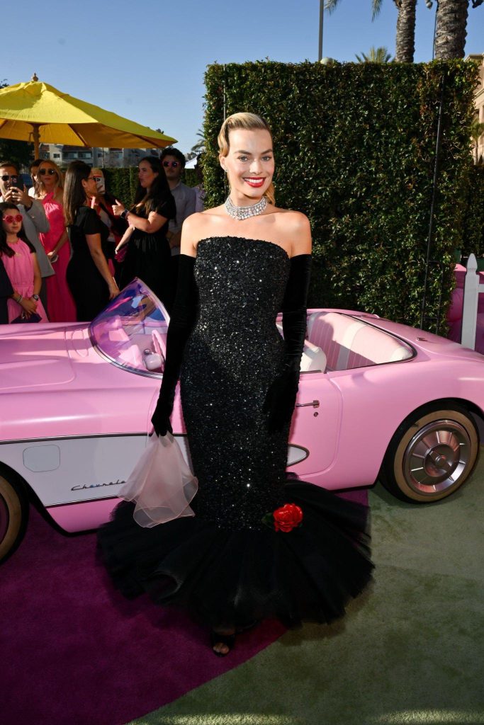 Margot Robbie Stuns as Barbie in 'Solo in the Spotlight' For the 'Barbie' Film Premiere