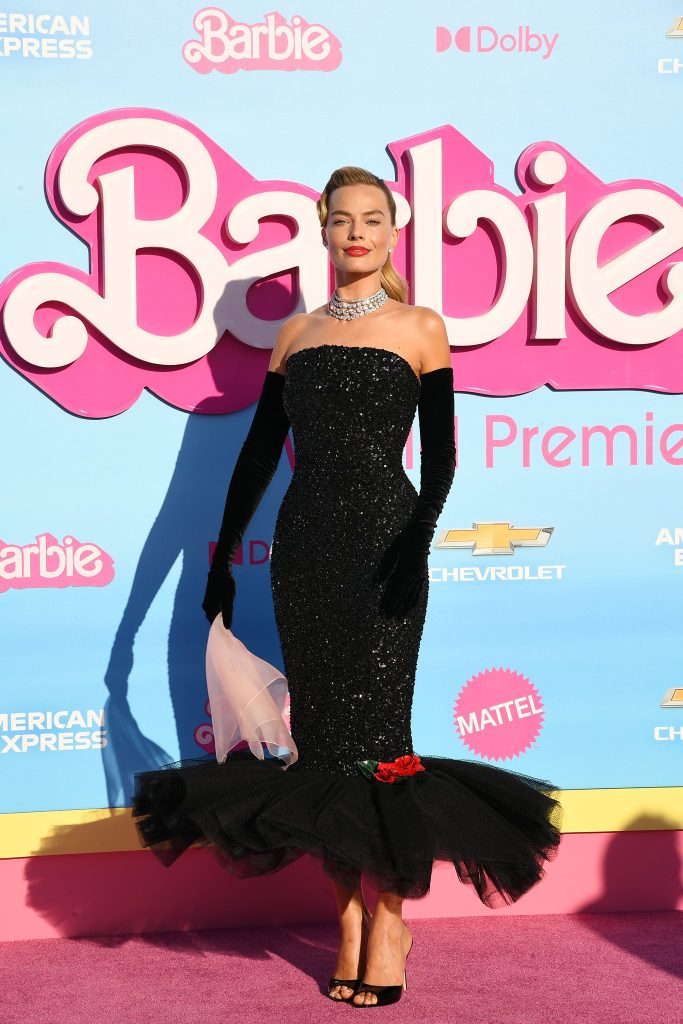 Margot Robbie Stuns as Barbie in 'Solo in the Spotlight' For the 'Barbie' Film Premiere