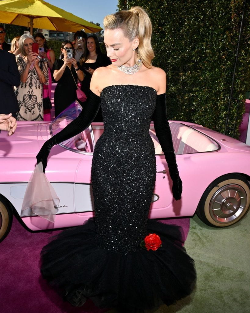 Margot Robbie Stuns as Barbie in 'Solo in the Spotlight' For the 'Barbie' Film Premiere