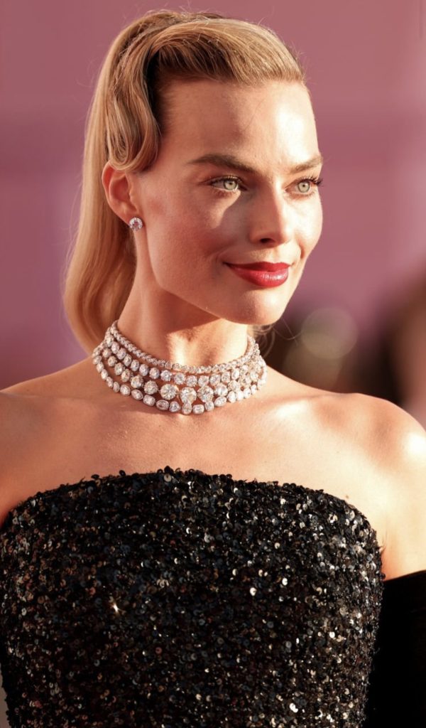 Margot Robbie Stuns as Barbie in 'Solo in the Spotlight' For the 'Barbie' Film Premiere