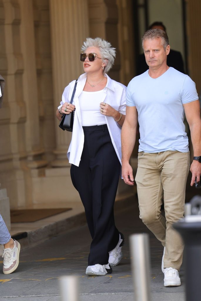 Florence Pugh Arrives with Grey Hair for Paris Fashion Week