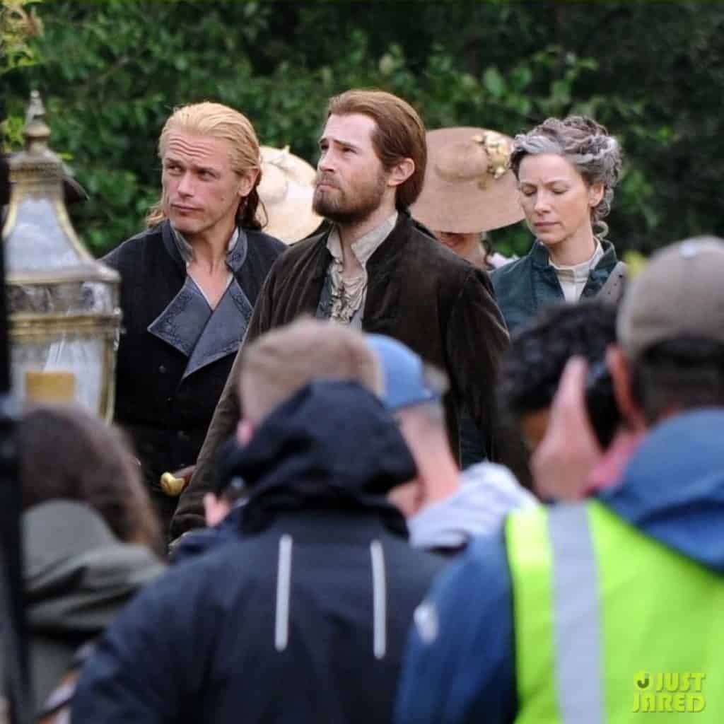 Image: Caitriona Balfe and Sam Heughan on the set of 'Outlander' season 8.