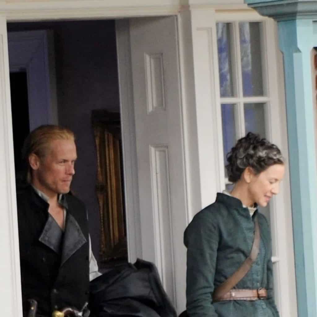 Image: Caitriona Balfe and Sam Heughan on the set of 'Outlander' season 8.