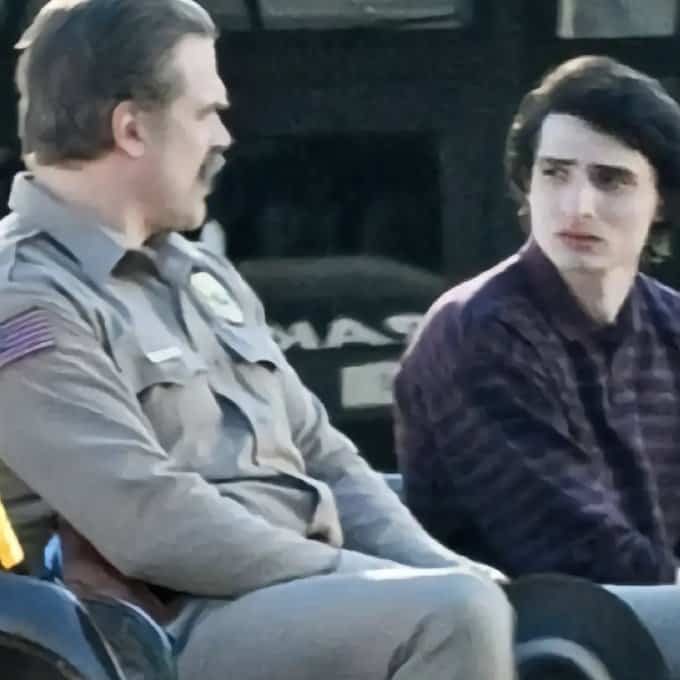 It is confirmed that David Harbour's Chief Jim Hopper will survive in Season 5. The image below shows that Indiana Jones and the Last Crusade is playing in theaters during the events of Season 5.