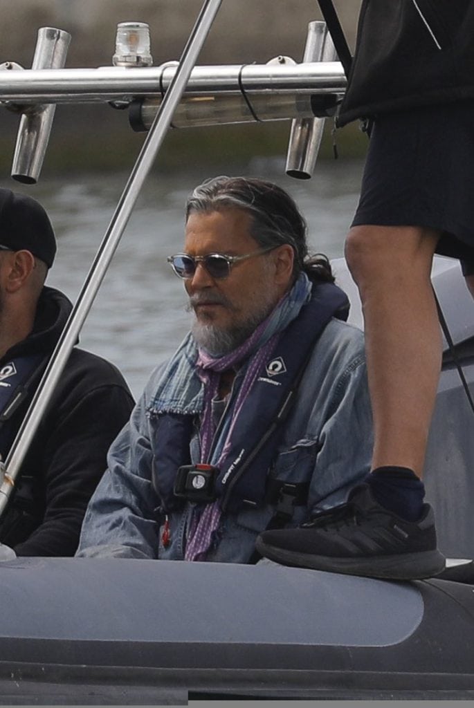 Johnny Depp and Madelyn Cline were seen filming Day Drinker aboard the vintage yacht Nero near Barcelona.