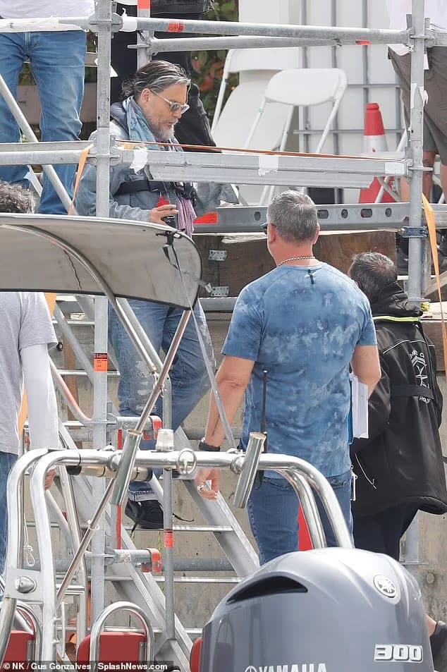 Johnny Depp and Madelyn Cline were seen filming Day Drinker aboard the vintage yacht Nero near Barcelona.