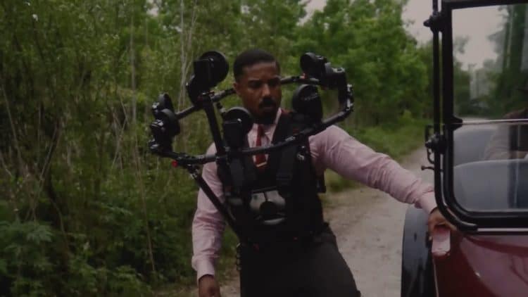 Warner Bros. Pictures reveals how twin scenes in Sinners were filmed using the innovative Halo Rig—featuring 10–12 cameras to capture Michael B. Jordan’s face and map it onto a stunt double in 50% of twin appearances.
