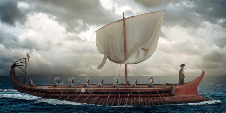 Christopher Nolan's upcoming adaptation of Homer's The Odyssey will be rated R, featuring mature themes and scenes of nudity. An intimacy coordinator has also been hired for the production.