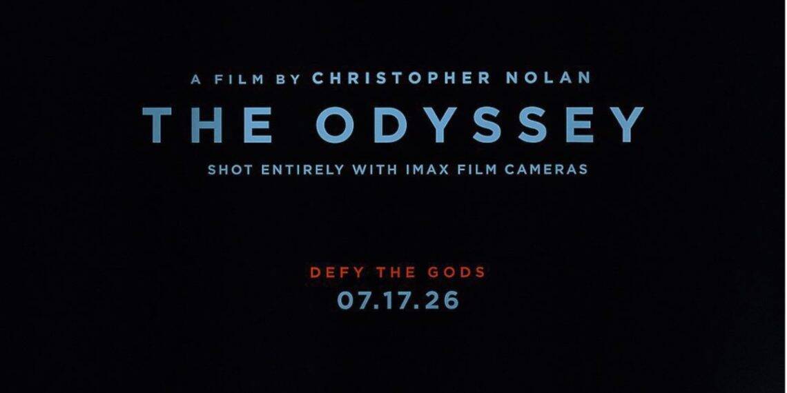 The first poster for Christopher Nolan’s The Odyssey has been revealed, featuring a sculpted Greek statue, the tagline “Defy the Gods,” and confirmation that it was shot entirely with IMAX film cameras. The teaser trailer is expected next week.
