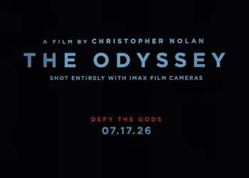 The first poster for Christopher Nolan’s The Odyssey has been revealed, featuring a sculpted Greek statue, the tagline “Defy the Gods,” and confirmation that it was shot entirely with IMAX film cameras. The teaser trailer is expected next week.