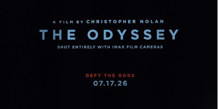 The first poster for Christopher Nolan’s The Odyssey has been revealed, featuring a sculpted Greek statue, the tagline “Defy the Gods,” and confirmation that it was shot entirely with IMAX film cameras. The teaser trailer is expected next week.
