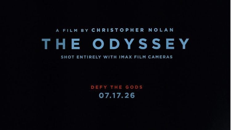 The first poster for Christopher Nolan’s The Odyssey has been revealed, featuring a sculpted Greek statue, the tagline “Defy the Gods,” and confirmation that it was shot entirely with IMAX film cameras. The teaser trailer is expected next week.