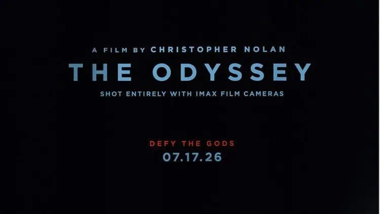 The first poster for Christopher Nolan’s The Odyssey has been revealed, featuring a sculpted Greek statue, the tagline “Defy the Gods,” and confirmation that it was shot entirely with IMAX film cameras. The teaser trailer is expected next week.