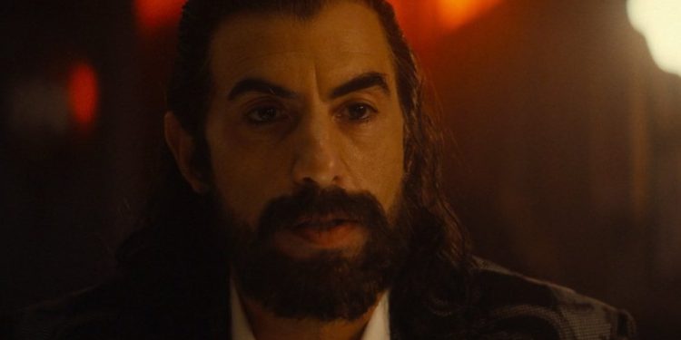 In Episode 6 of Ironheart, "The Past Is the Past," Sacha Baron Cohen debuts as Mephisto, revealed to have given Parker Robbins the Hood in a dark deal.