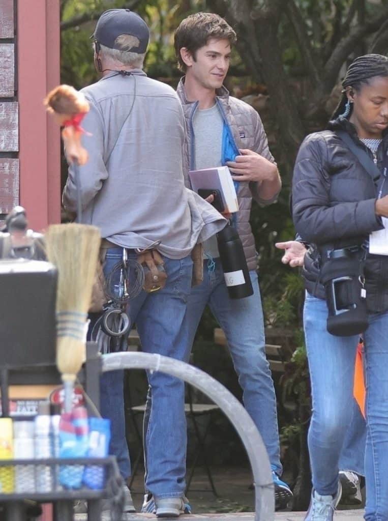 Filming for Luca Guadagnino’s OpenAI film Artificial has begun in San Francisco. Andrew Garfield was spotted on set as Sam Altman, wearing a silver puffer jacket, gray T-shirt, and jeans.