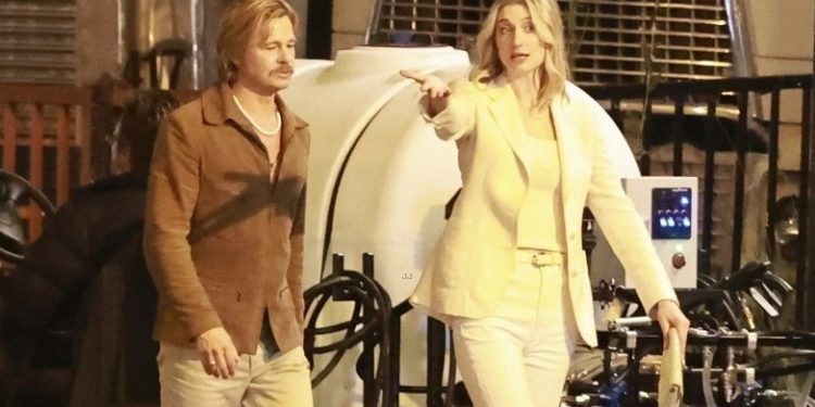 Brad Pitt and Elizabeth Debicki were spotted filming David Fincher's The Adventures of Cliff Booth in Los Angeles, showcasing their 1970s-inspired looks on set.