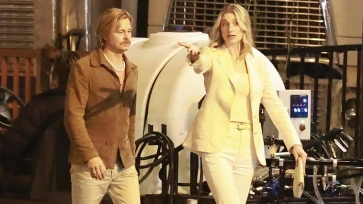Brad Pitt and Elizabeth Debicki were spotted filming David Fincher's The Adventures of Cliff Booth in Los Angeles, showcasing their 1970s-inspired looks on set.