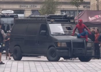The first look at Tom Holland’s Spider-Man atop the Punisher van on the set of Marvel’s Spider-Man: Brand New Day in Glasgow, Scotland has been revealed.