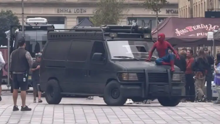 The first look at Tom Holland’s Spider-Man atop the Punisher van on the set of Marvel’s Spider-Man: Brand New Day in Glasgow, Scotland has been revealed.