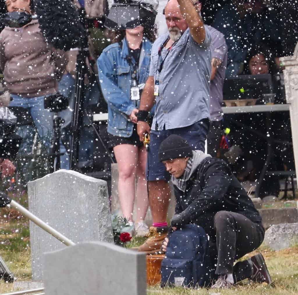 New set images from Marvel's Spider-Man: Brand New Day show Tom Holland's Peter Parker delivering flowers to Aunt May’s grave, filmed at Brookwood Cemetery in Surrey, London.
