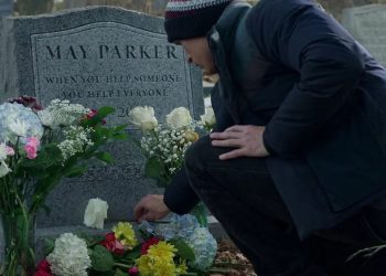 New set images from Marvel's Spider-Man: Brand New Day show Tom Holland's Peter Parker delivering flowers to Aunt May’s grave, filmed at Brookwood Cemetery in Surrey, London.