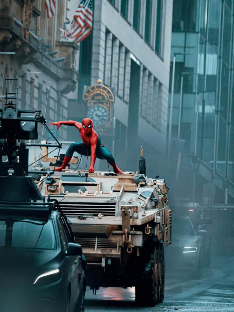 Sadie Sink has been spotted filming Spider-Man: Brand New Day in Glasgow, sparking rumors she’s playing Gwen Stacy. Leaked set photos show her with blonde hair during a tank scene in a New York-style street.