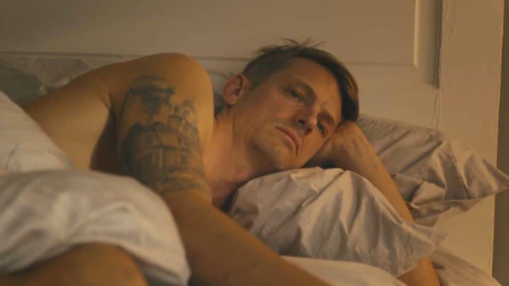 David Ayer's Suicide Squad is now canon in James Gunn's DCU, confirmed in Peacemaker Season 2, Episode 3. Rick Flag Jr. returns with a reimagined backstory, new role, and surprising ties to Emilia Harcourt.