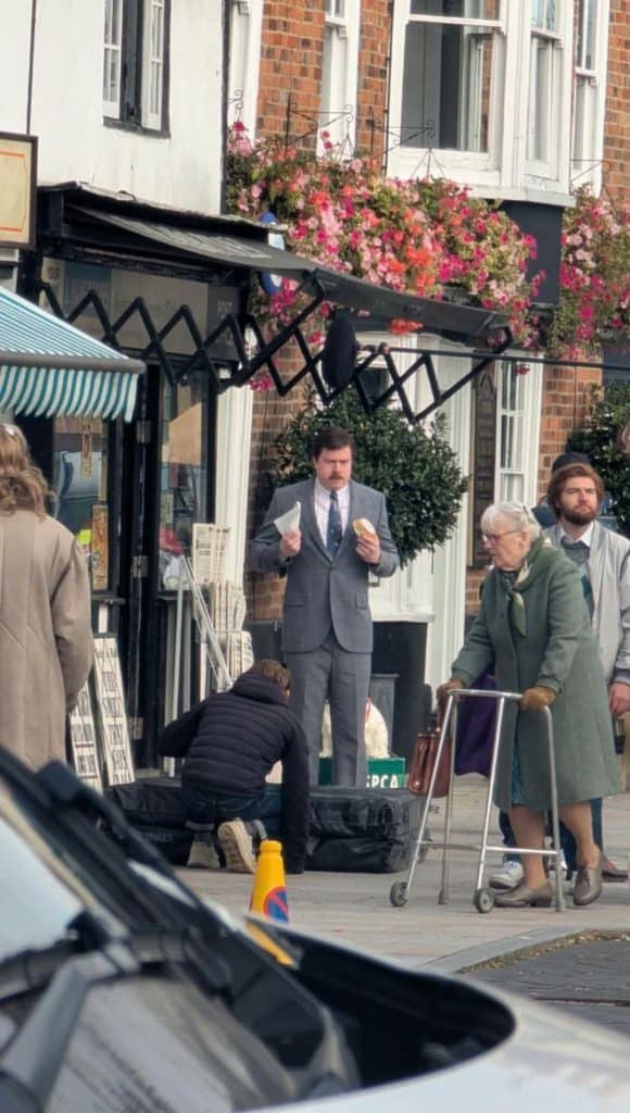 First look at Daniel Rigby as Vernon Dursley and Jon Furlong as Dedalus Diggle on the set of the Harry Potter series filming in Hoddesdon, England. Leaked images reveal a book-accurate opening scene not shown in the films.