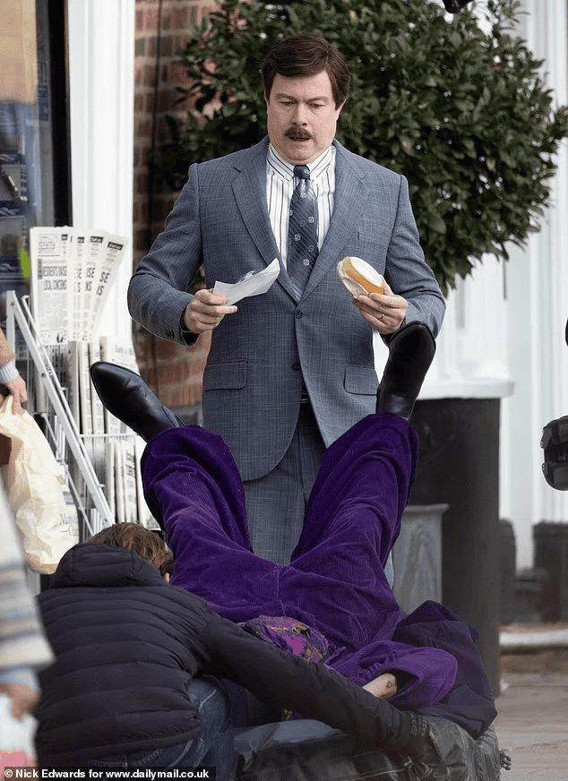 First look at Daniel Rigby as Vernon Dursley and Jon Furlong as Dedalus Diggle on the set of the Harry Potter series filming in Hoddesdon, England. Leaked images reveal a book-accurate opening scene not shown in the films.