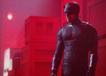 The first look at Charlie Cox’s Daredevil in Daredevil: Born Again Season 2 reveals a darker suit inspired by Marvel’s Shadowland storyline, featuring textured armor and the classic “DD” logo.