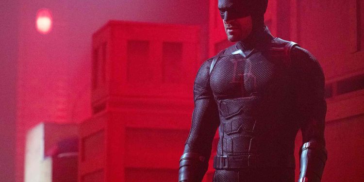 The first look at Charlie Cox’s Daredevil in Daredevil: Born Again Season 2 reveals a darker suit inspired by Marvel’s Shadowland storyline, featuring textured armor and the classic “DD” logo.