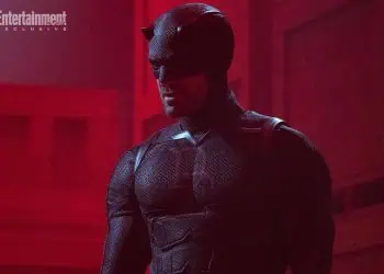 The first look at Charlie Cox’s Daredevil in Daredevil: Born Again Season 2 reveals a darker suit inspired by Marvel’s Shadowland storyline, featuring textured armor and the classic “DD” logo.