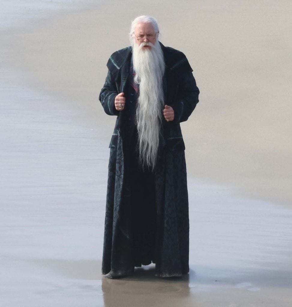 The first look at John Lithgow as Professor Albus Dumbledore in HBO’s Harry Potter series has been revealed, with filming taking place on a beach in Cornwall, England.