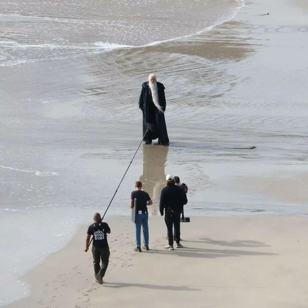 The first look at John Lithgow as Professor Albus Dumbledore in HBO’s Harry Potter series has been revealed, with filming taking place on a beach in Cornwall, England.