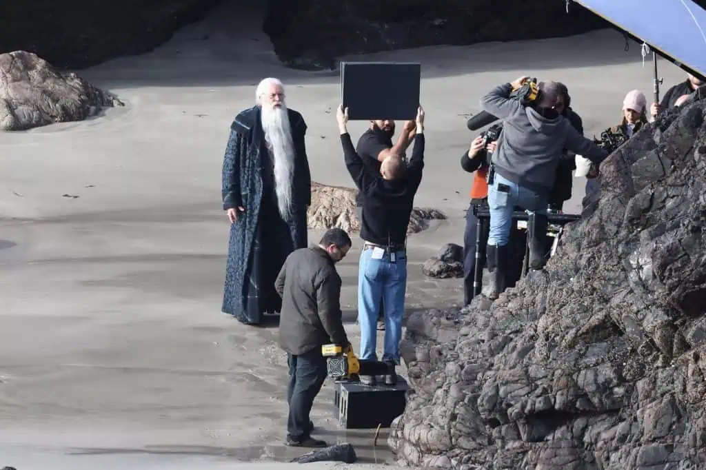 The first look at John Lithgow as Professor Albus Dumbledore in HBO’s Harry Potter series has been revealed, with filming taking place on a beach in Cornwall, England.