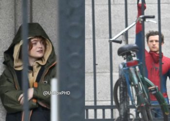 See Sadie Sink on the set of Marvel’s Spider-Man: Brand New Day with Tom Holland in London. She wears military-style boots and yellow pants, while director Destin Daniel Cretton is nearby.