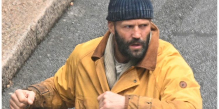 Jason Statham returns as The Beekeeper in the upcoming sequel, with filming currently taking place in London. Recent set photos show Statham and Emmy Raver-Lampman shooting an action scene in Canary Wharf.