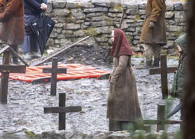 The first look at Lily-Rose Depp on the set of Robert Eggers’ Werwulf in Bourne Wood, England. Depp appears nearly unrecognizable in a gritty, medieval-inspired costume that reflects the film’s dark historical tone.