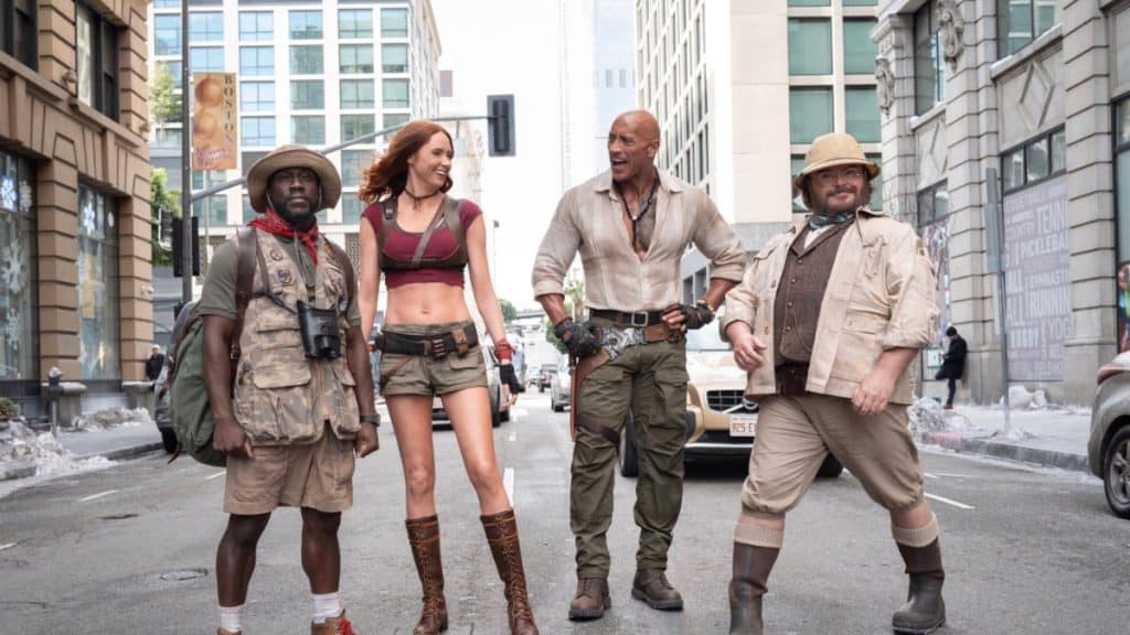 Sony Pictures has released the first look at Jumanji 4, teasing a major spoiler as filming begins in Los Angeles with stars Dwayne Johnson, Kevin Hart, Karen Gillan, and Jack Black. See what the new image reveals.