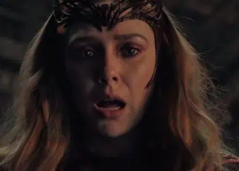 A new report claims Avengers: Doomsday will feature a heroic Scarlet Witch variant from the Earth-10005 X-Men universe. Insider James Mack describes her redesigned look, including a long red dress, gloves, and her iconic headpiece.