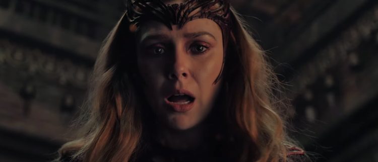 A new report claims Avengers: Doomsday will feature a heroic Scarlet Witch variant from the Earth-10005 X-Men universe. Insider James Mack describes her redesigned look, including a long red dress, gloves, and her iconic headpiece.