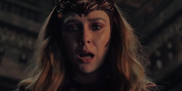 A new report claims Avengers: Doomsday will feature a heroic Scarlet Witch variant from the Earth-10005 X-Men universe. Insider James Mack describes her redesigned look, including a long red dress, gloves, and her iconic headpiece.