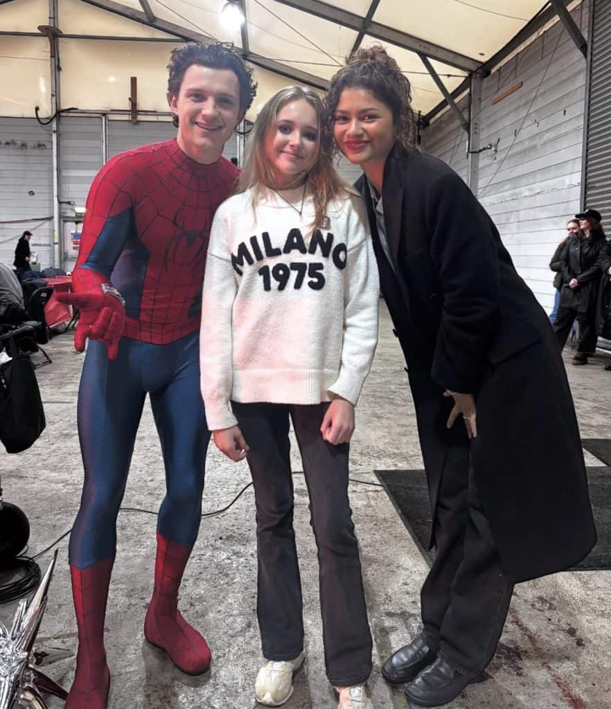 New set photos from Marvel's Spider-Man: Brand New Day show Tom Holland and Zendaya interacting with fans during filming at Pinewood Studios in the UK. Fans are excited as production ramps up for the next chapter in the Spider-Man saga.
