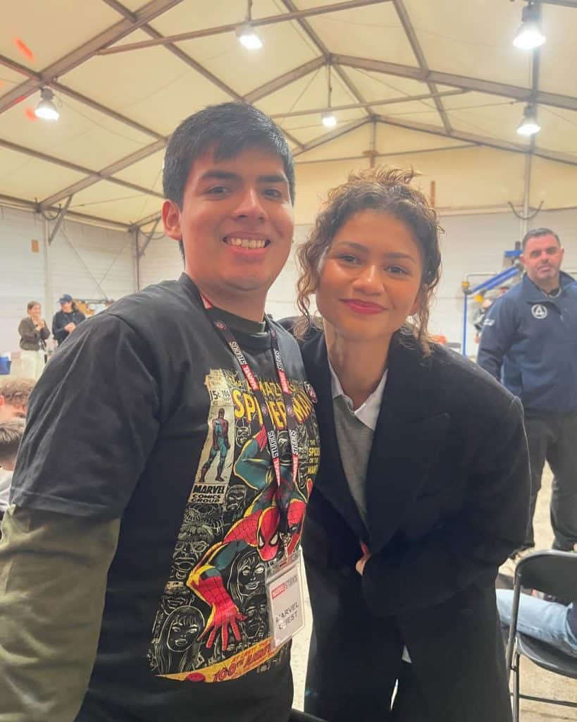 New set photos from Marvel's Spider-Man: Brand New Day show Tom Holland and Zendaya interacting with fans during filming at Pinewood Studios in the UK. Fans are excited as production ramps up for the next chapter in the Spider-Man saga.
