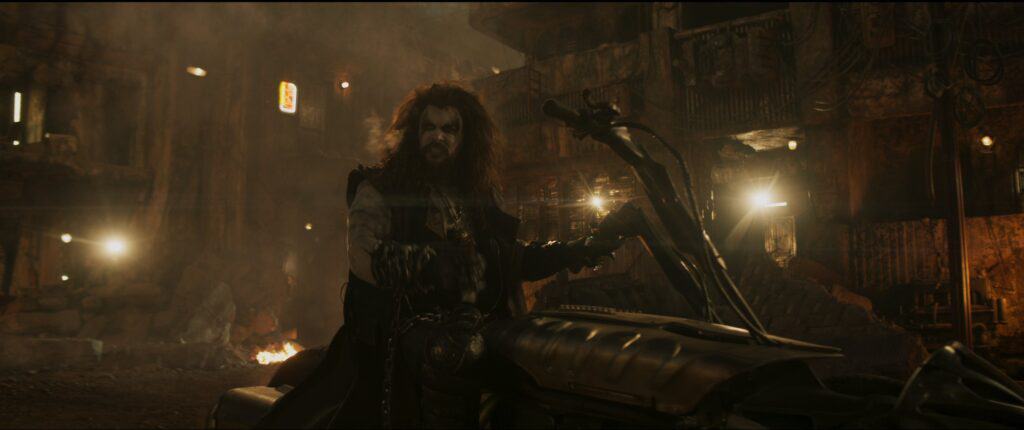 James Gunn reveals a new look at Jason Momoa as Lobo in DC’s Supergirl. The teaser shows the intergalactic bounty hunter in action with his motorcycle and signature laugh.