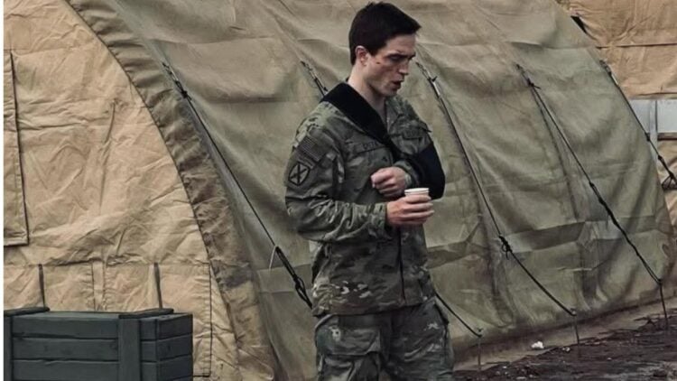 The new images of Robert Pattinson on the set of Fernando Meirelles' upcoming Netflix heist thriller Here Comes the Flood have been revealed. While filming for Here Comes the Flood in New Jersey wrapped up a few days ago, Pattinson traveled to Morocco to shoot some additional scenes. In the images, Pattinson is seen dressed in a military-style camouflage uniform.