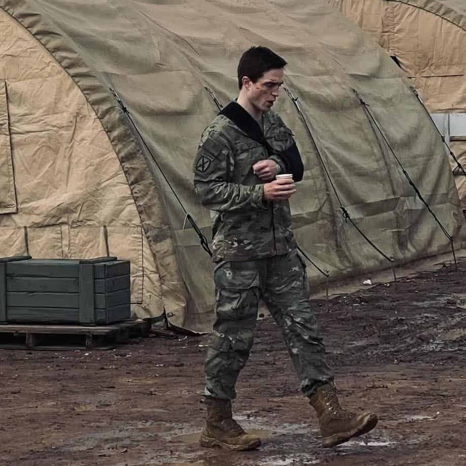 The new images of Robert Pattinson on the set of Fernando Meirelles' upcoming Netflix heist thriller Here Comes the Flood have been revealed. While filming for Here Comes the Flood in New Jersey wrapped up a few days ago, Pattinson traveled to Morocco to shoot some additional scenes. In the images, Pattinson is seen dressed in a military-style camouflage uniform.